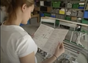 woman reading garage door manual